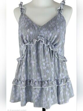 Sleeveless Ruffled Peplum Top in Lavender Dot Print